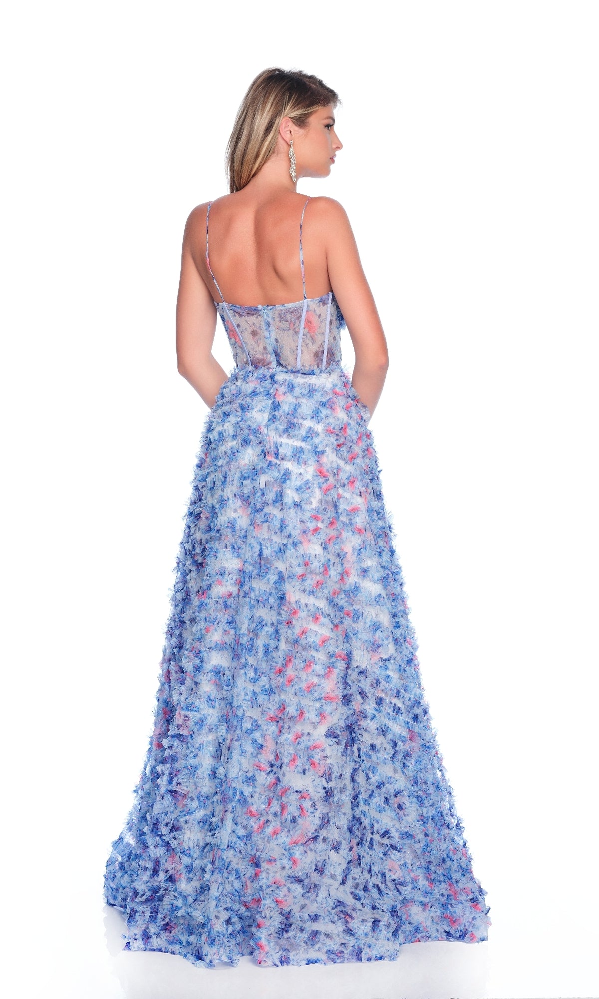 Woman facing away in the Dave & Johnny 12140 Mini-Ruffle Print Prom Dress, featuring a sleeveless a-line silhouette with thin straps and flared skirt, set against a plain white background.